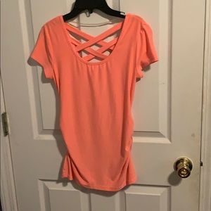 Bright peach t-shirt with crisscross back detail